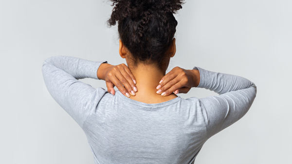 Woman with back pain from car accident